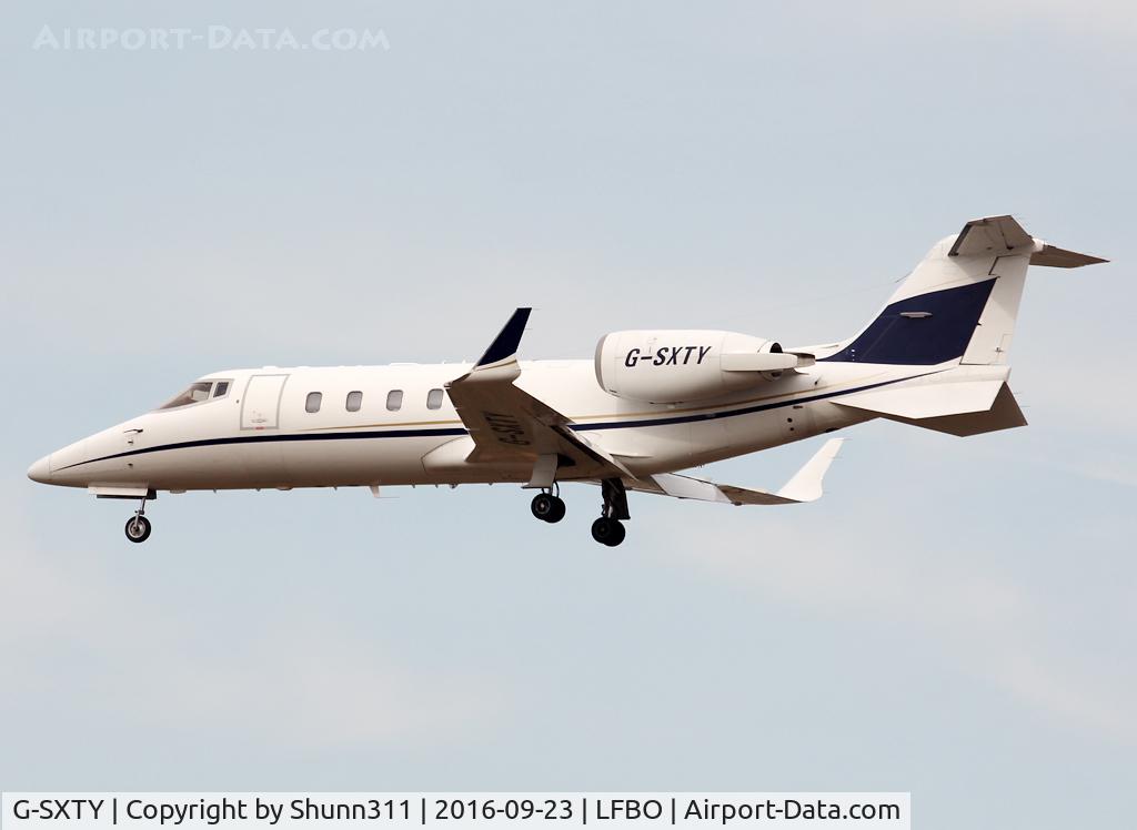 G-SXTY, 2004 Learjet 60 C/N 60-280, Landing rwy 32L