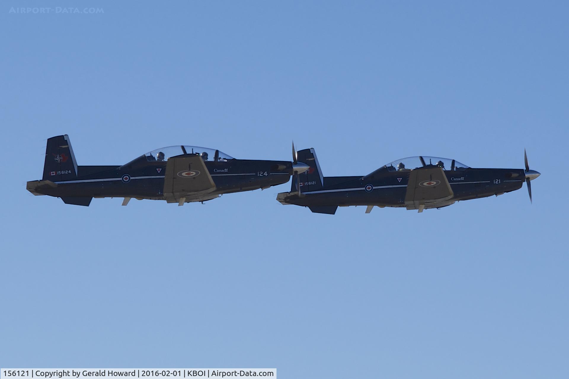 156121, Raytheon CT-156 Harvard II C/N PF-21, Departing RWY 28R with 156124. No.2 CFFTS, Moose Jaw, Saskatchewan, Canada.