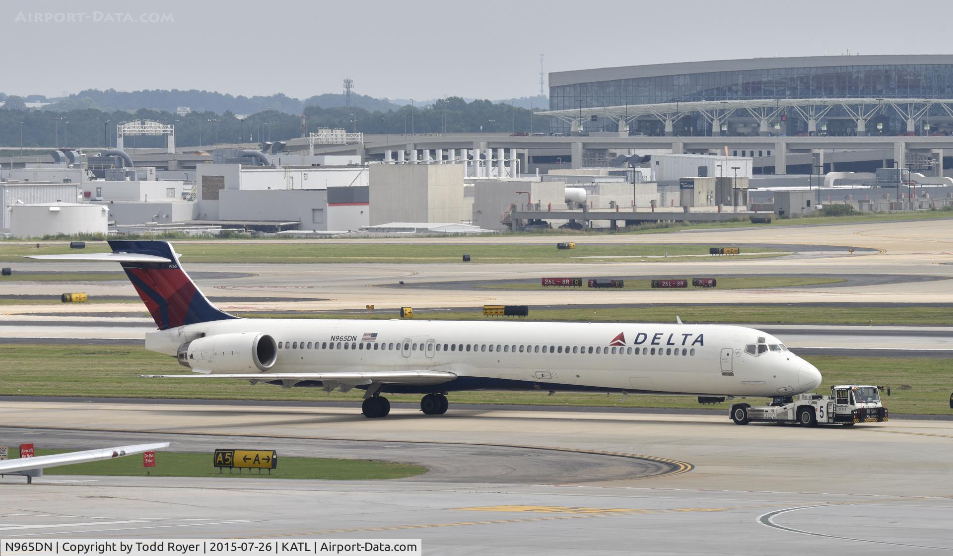 N965DN, 2001 McDonnell Douglas MD-90-30 C/N 60002, Getting towed at Atlanta