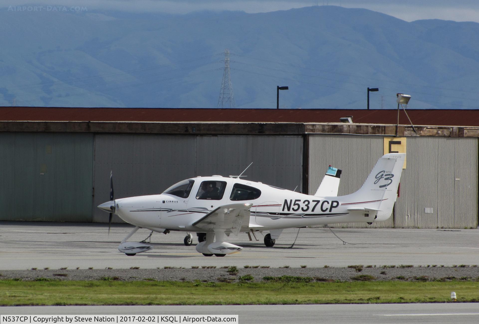 N537CP, 2008 Cirrus SR22 G3 C/N 3038, Locally-based 2008 Cirrus SR22 taxiing into general aviation ramp area @ San Carlos Airport, CA