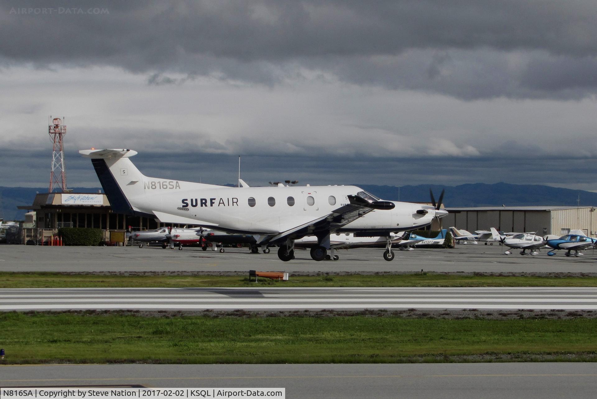 N816SA, 2014 Pilatus PC-12/47E C/N 1499, Surf Air 2014 Pilatus PC-12/47E over the threshold @ San Carlos Airport, CA