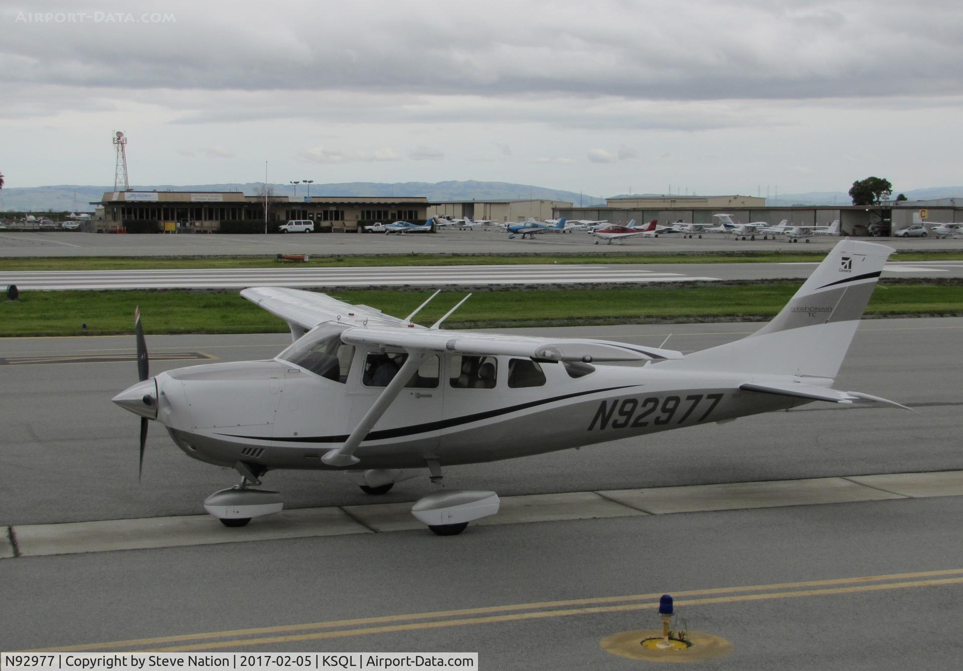 N92977, Cessna T206H Turbo Stationair C/N T20609020, Locally-based 2011 Cessna T206H Stationair taxiing for take-off before the rains came @ San Carlos Airport, CA