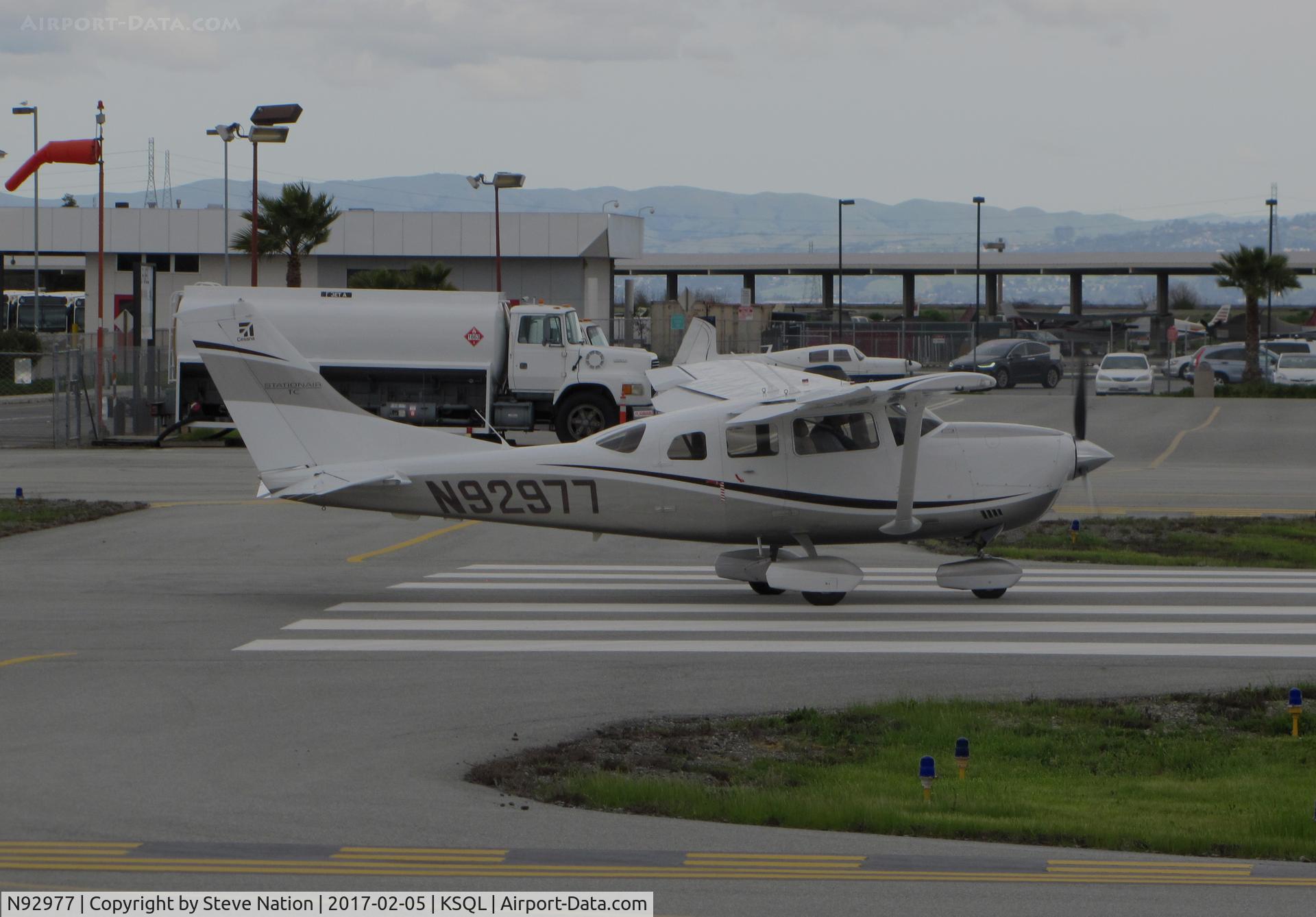 N92977, Cessna T206H Turbo Stationair C/N T20609020, Locally-based 2011 Cessna T206H Stationair turning on to RWY 12 @ San Carlos Airport, CA