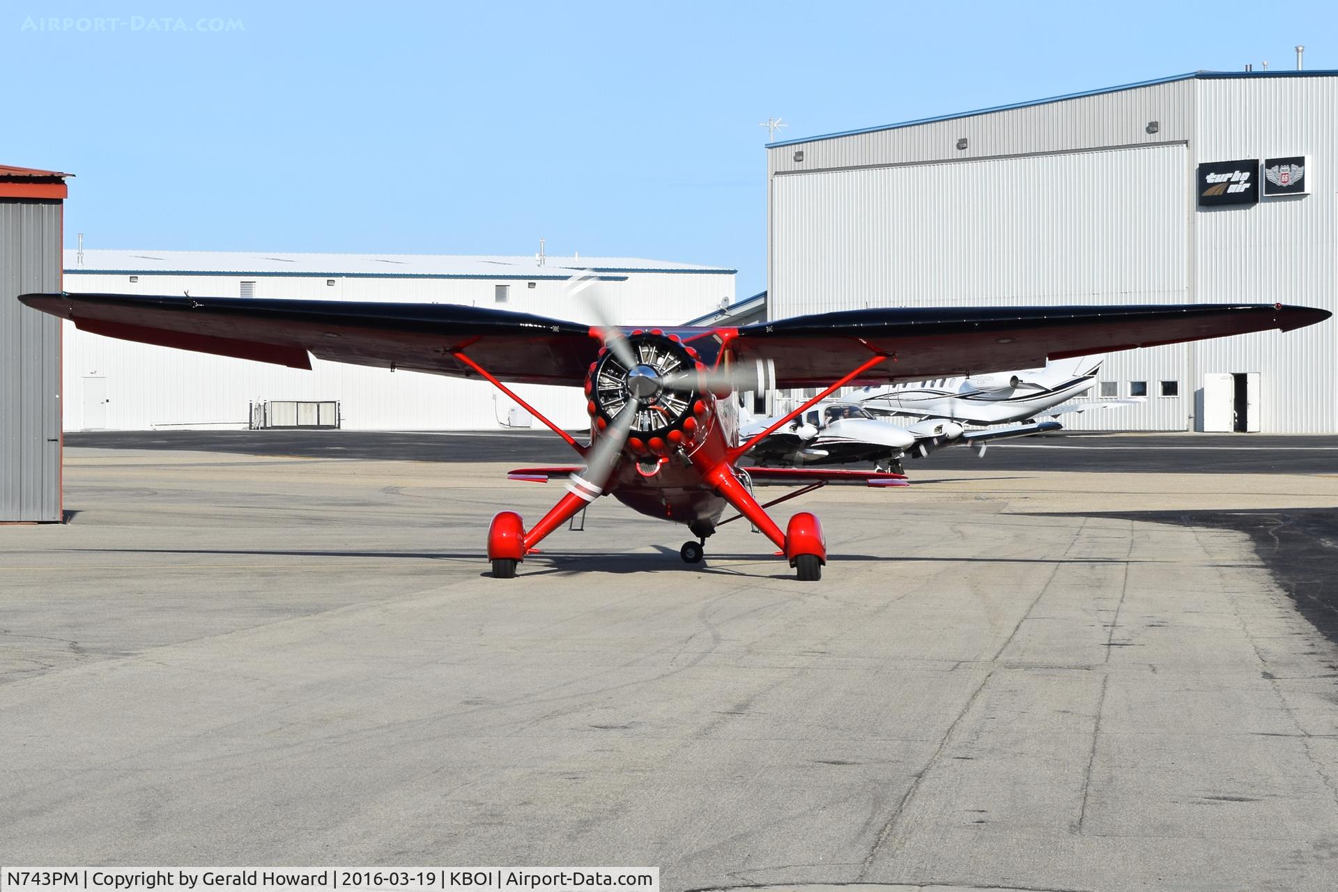 N743PM, Stinson V77 Reliant C/N 77-109, Taxi from the old city hangars in the airport's SW corner.