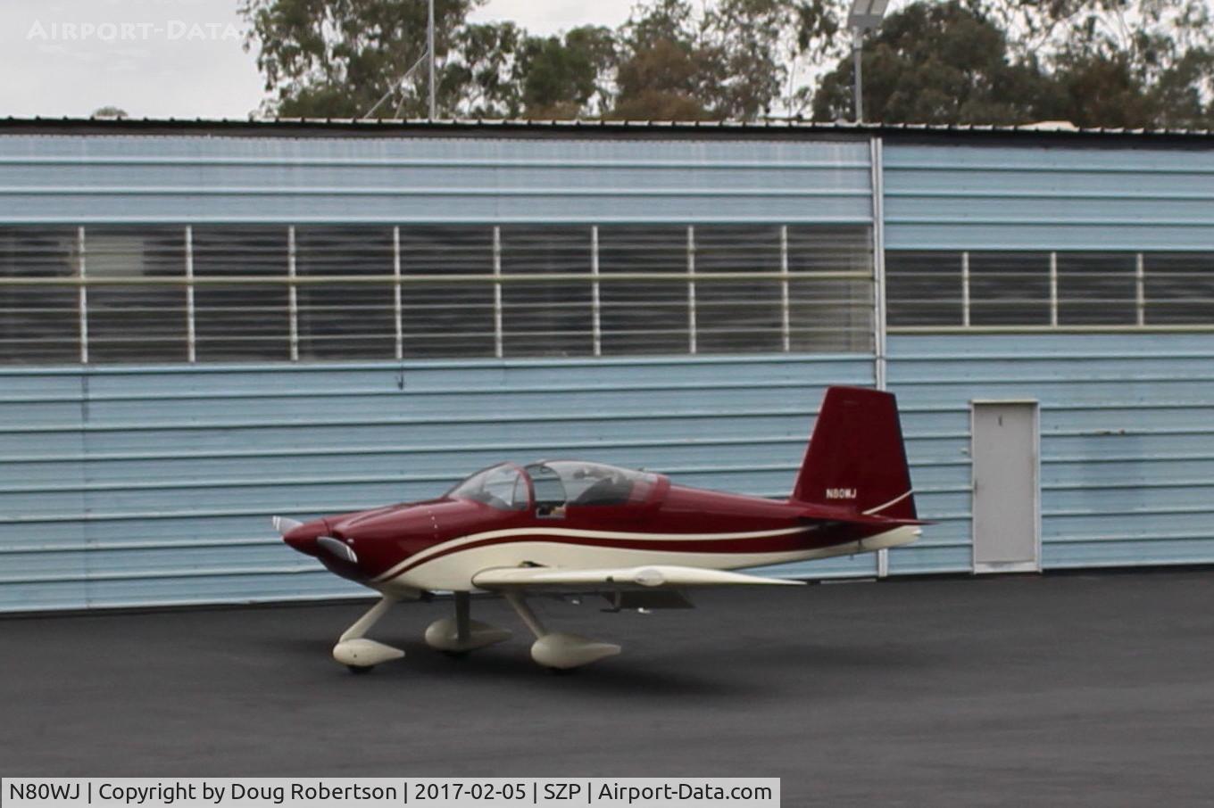 N80WJ, 2014 Vans RV-7A C/N 72575, 2015 Richmond VAN's RV-7A, ECI TITAN IOX-360-A4H1N 191 Hp, outside its hangar, -7A is the tri-gear version. Side by side seats, I have flown in a tail-dragger RV-6 and an RV-7. Both good flying aircraft.