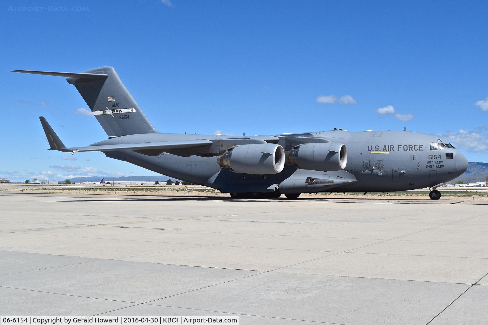 06-6154, 2006 Boeing C-17A Globemaster III C/N P-154, On taxiway Bravo for RWY 28L. 60th Air Mobility Wing, Travis AFB, CA.