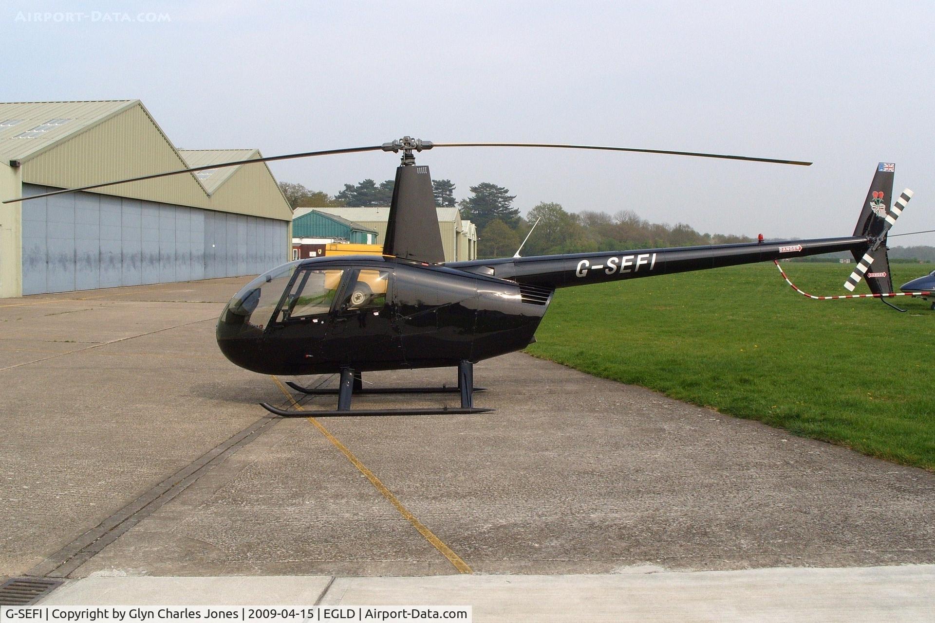 G-SEFI, 2003 Robinson R44 Raven II C/N 10147, With thanks to the chief engineer of Heli Air who granted me authority to take photographs on this part of the aerodrome. Previously N75271. Owned by Kermann Avionics Sales Ltd.