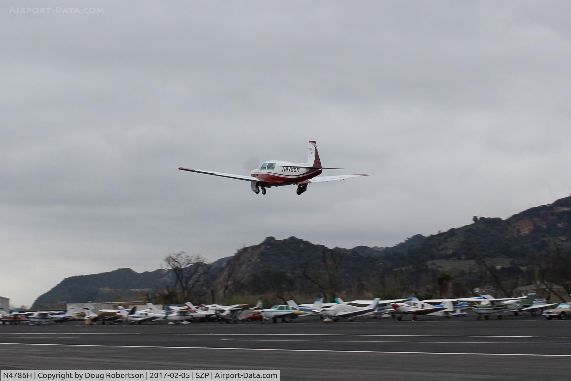 N4786H, 1979 Mooney M20J 201 C/N 24-0876, 1979 Mooney M20J 201, Lycoming IO-360 A&C 200 Hp, takeoff climb Rwy 04, gear coming up