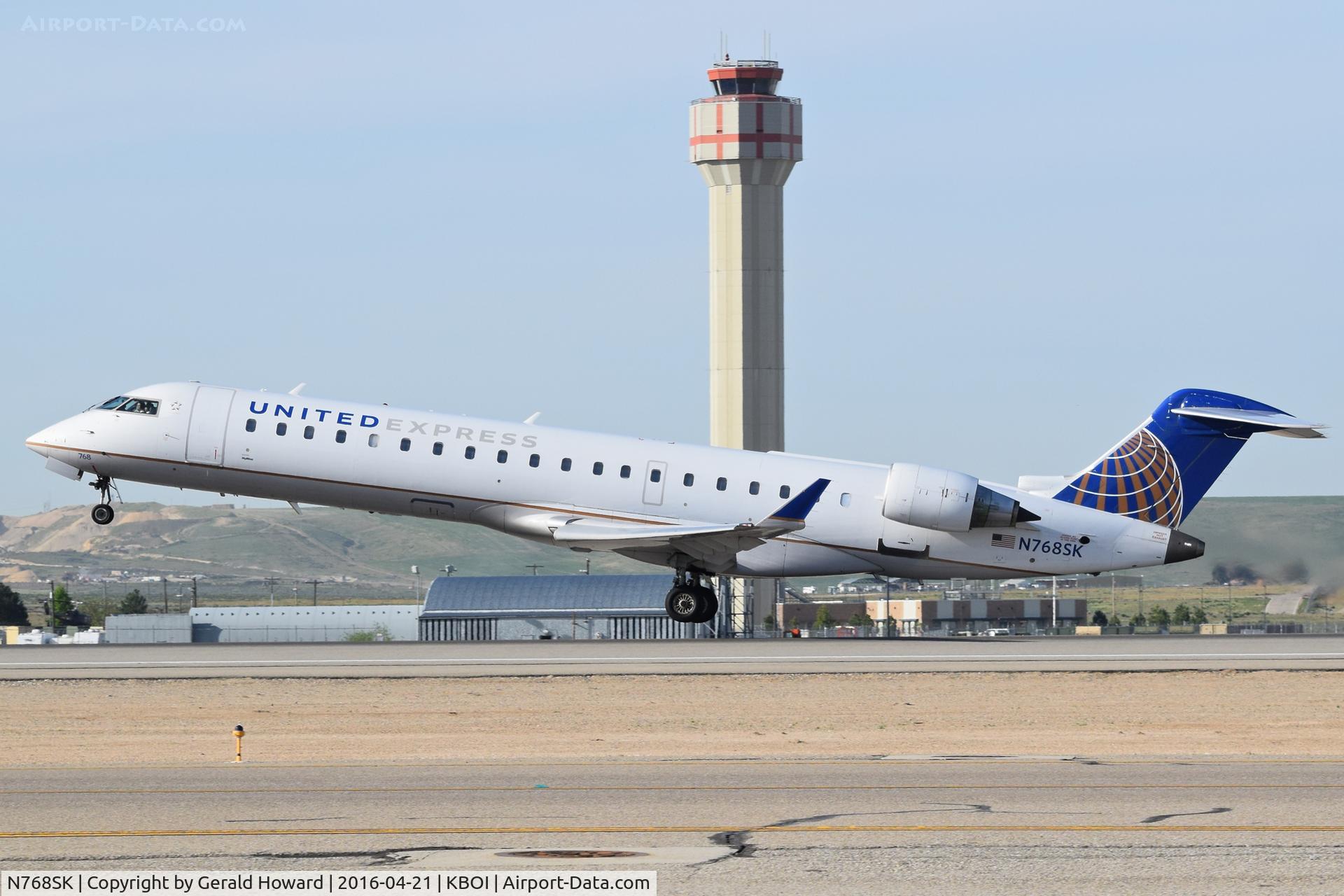 N768SK, 2005 Bombardier CRJ-701ER (CL-600-2C10) Regional Jet C/N 10234, Departing RWY 10L.