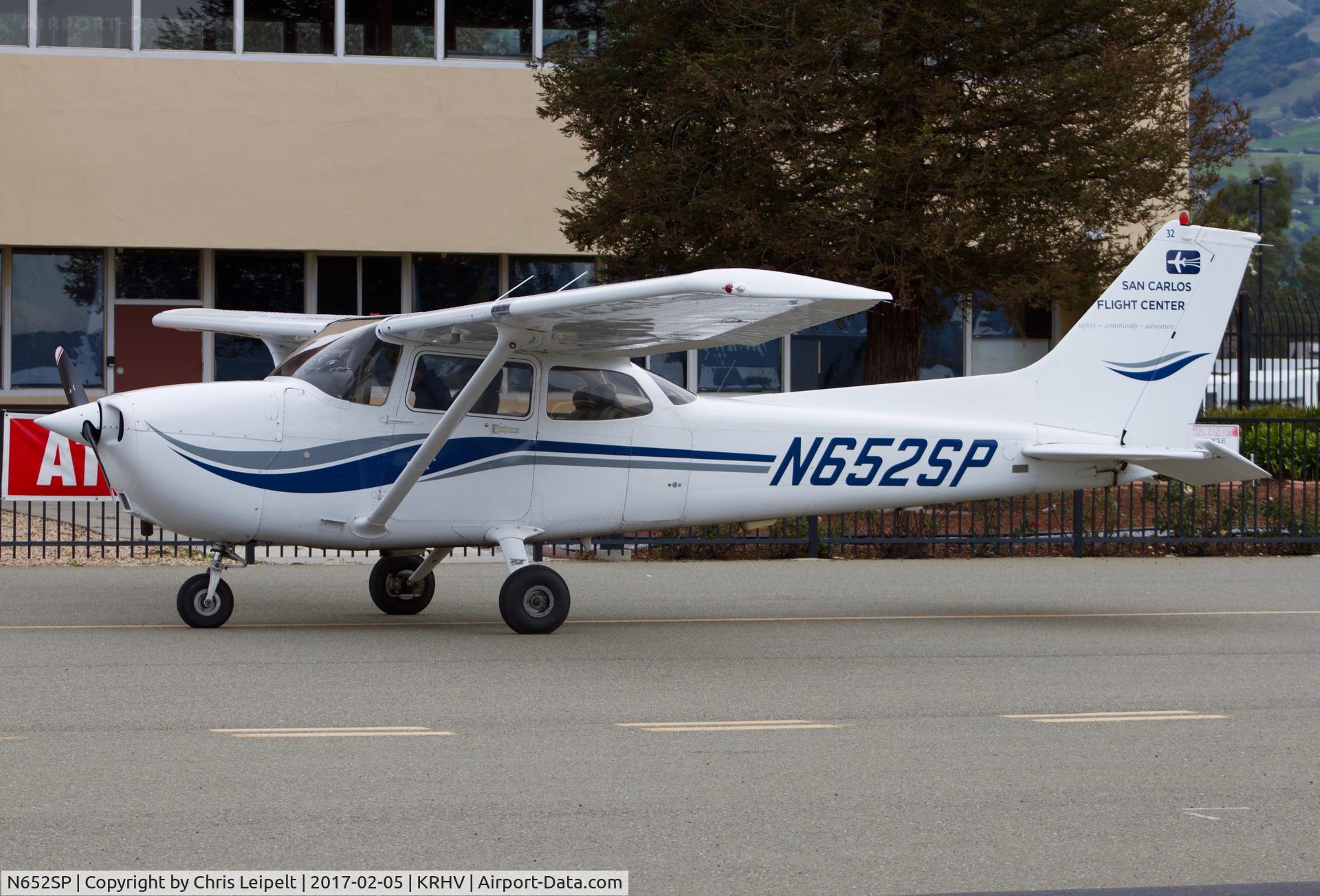 N652SP, 1998 Cessna 172S C/N 172S8058, San Carlos Flight School's 1998 Cessna 172S parked in front of the terminal, ready to taxi out at Reid Hillview Airport, San Jose, CA.