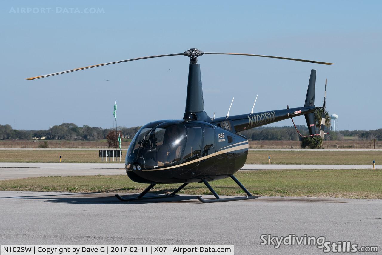 N102SW, 2012 Robinson R66 C/N 0106, Parked at Lake Wales, FL