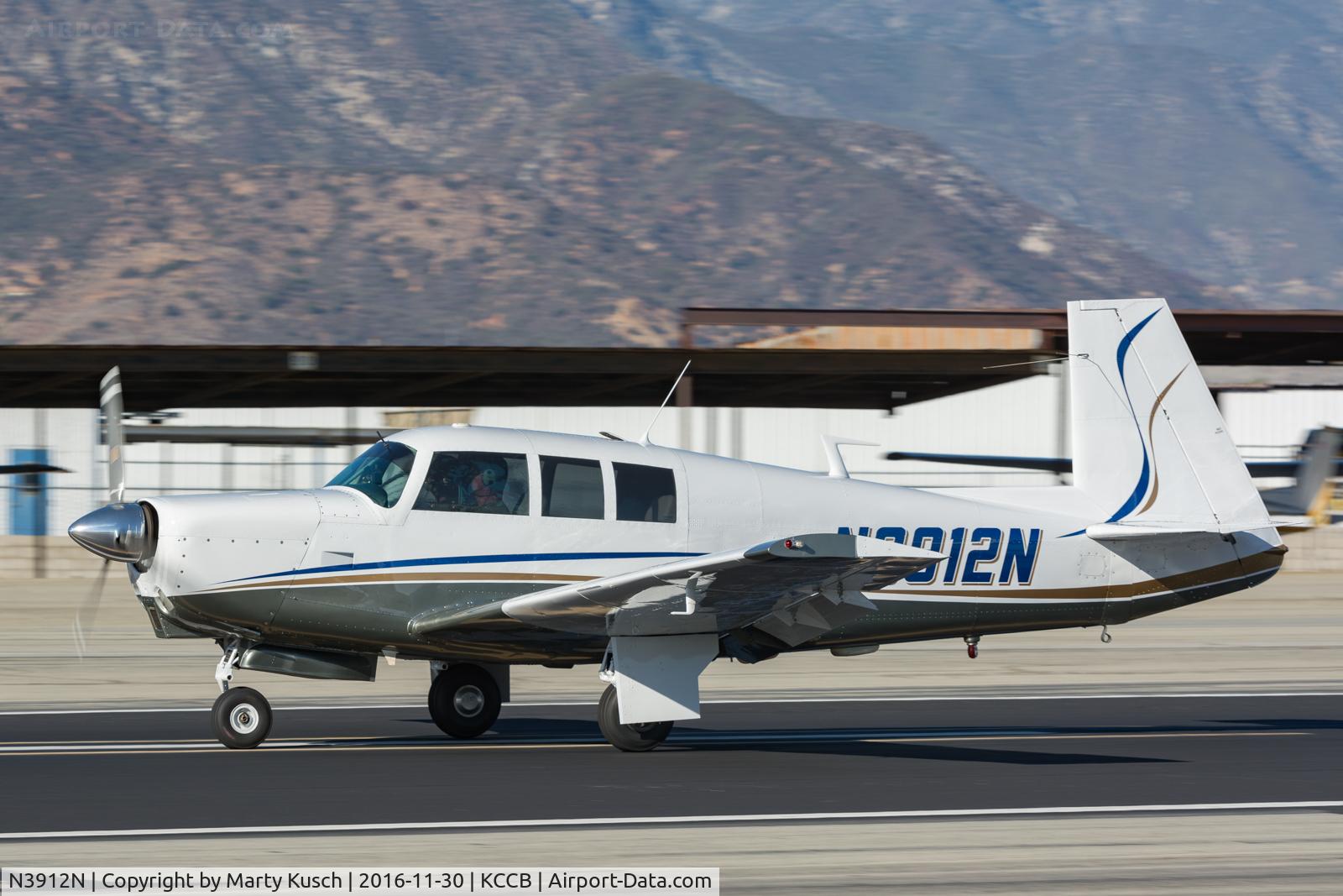 N3912N, 1968 Mooney M-20G Statesman C/N 680059, Landing roll out Runway 24.