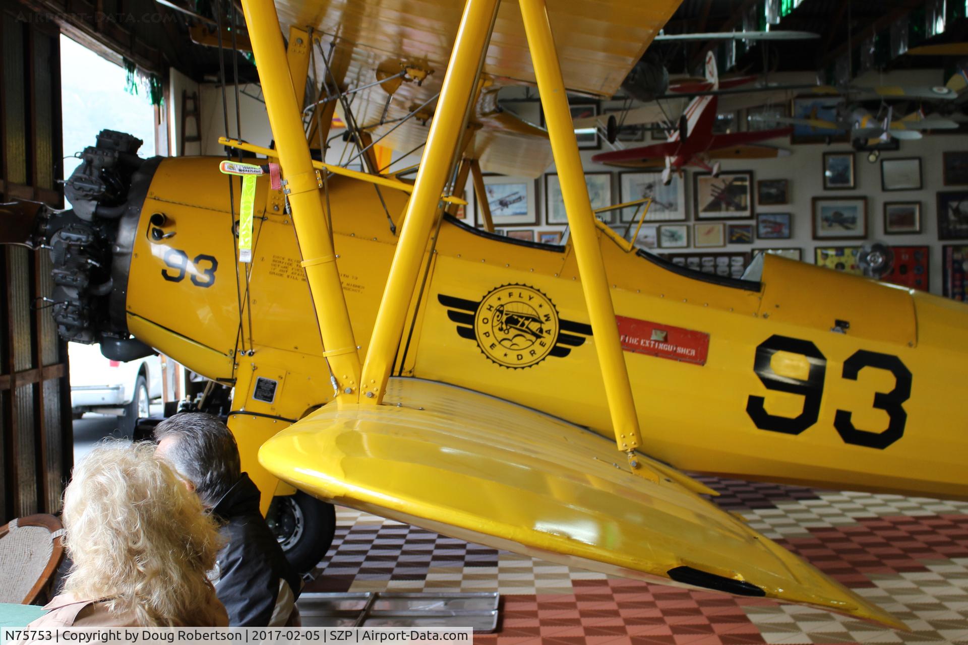 N75753, 1942 Boeing A75N1 (PT17) C/N 75-3521, 1942 Boeing Stearman A75N1 (PT-17) as N2S-4, Continental W670 220 Hp radial, limited access points prevents full photo of aircraft in the Aviation Museum of Santa Paula Bucker hangar.