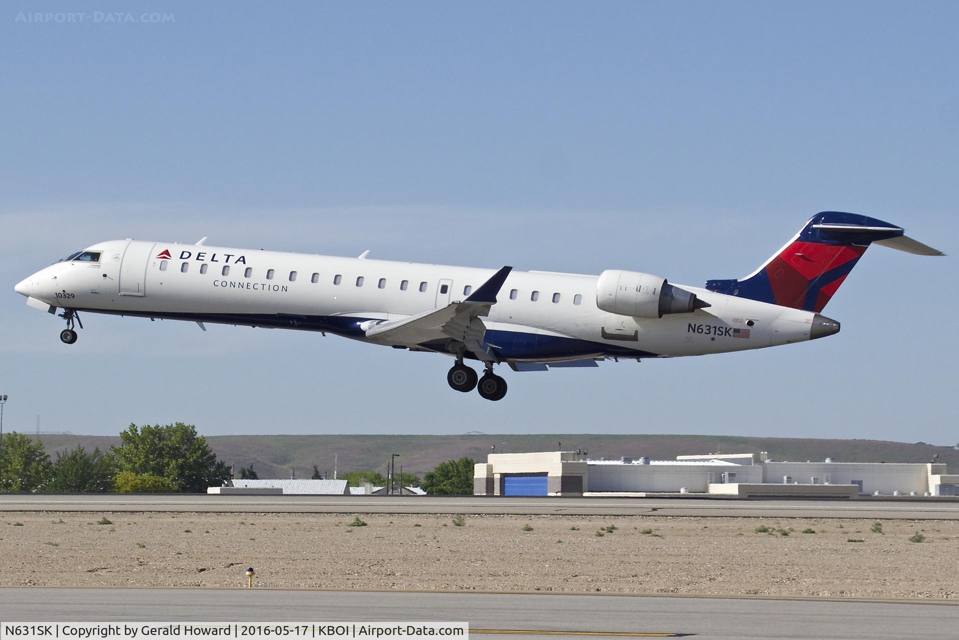 N631SK, 2011 Bombardier CRJ-700 (CL-600-2C10) Regional Jet C/N 10329, Landing RWY 10L.
