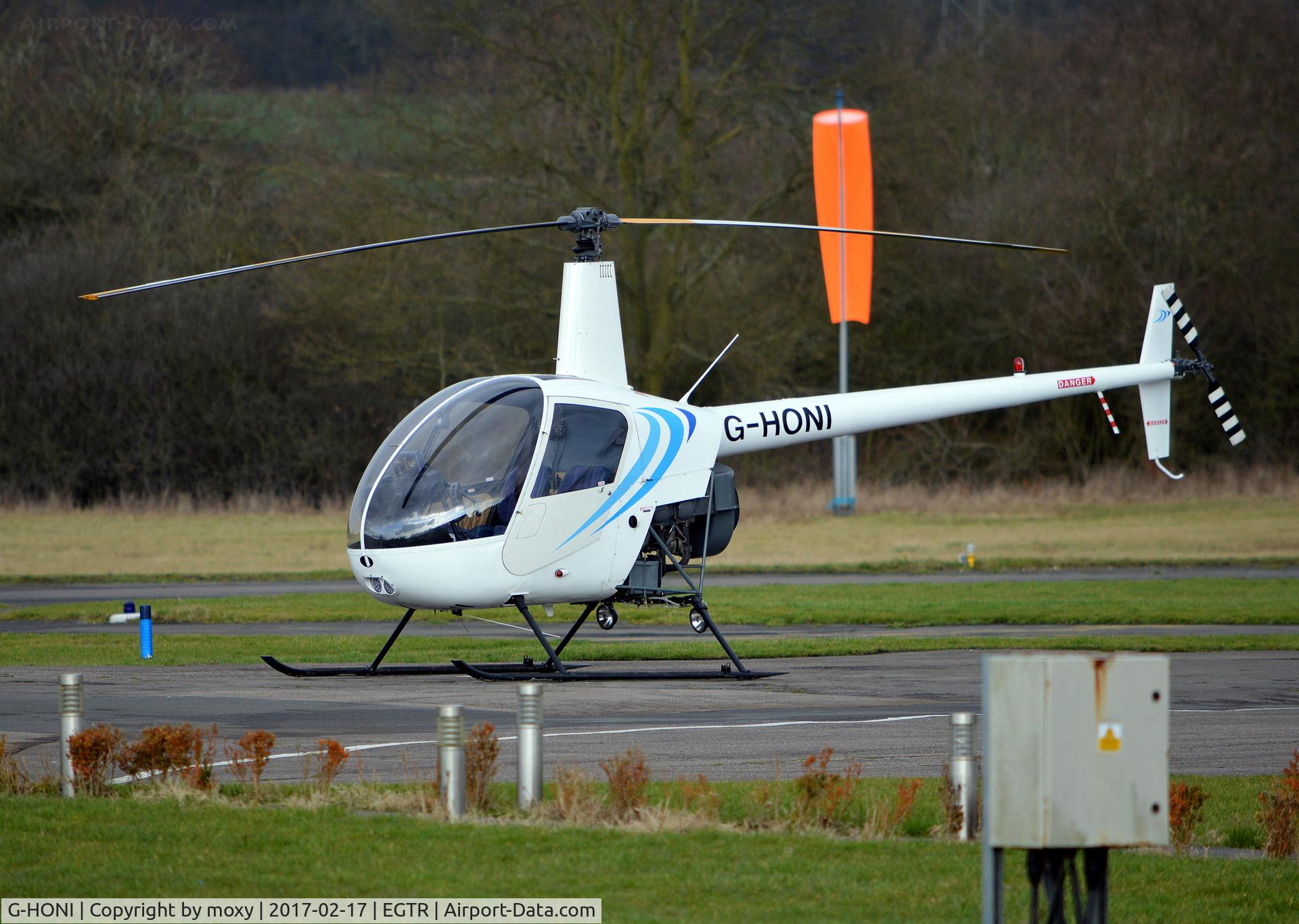 G-HONI, 1988 Robinson R22 Beta C/N 0871, Robinson R22 Beta at Elstree.