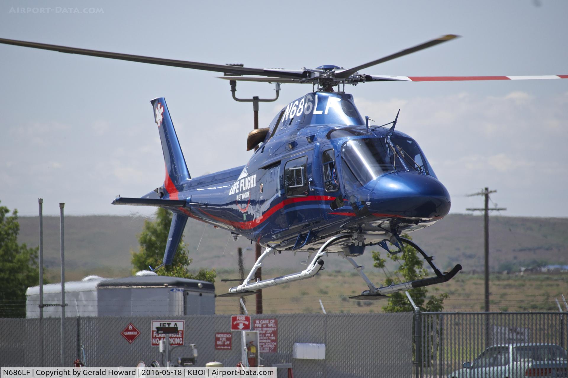 N686LF, 2015 AgustaWestland AW-119 MkII Koala C/N 14832, Departing Life Flight landing ramp.