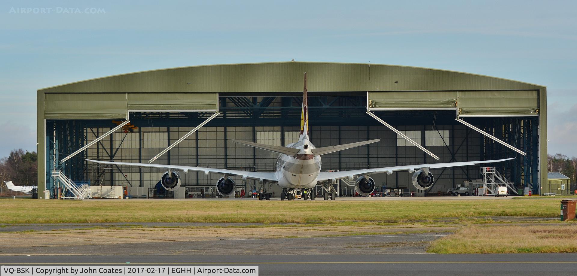 VQ-BSK, 2015 Boeing 747-8ZV BBJ C/N 42096, Hangar doors opening for this resident's return