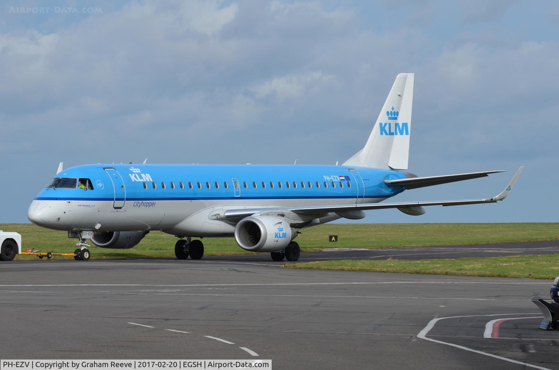 PH-EZV, 2012 Embraer 190LR (ERJ-190-100LR) C/N 19000528, Under tow at Norwich.