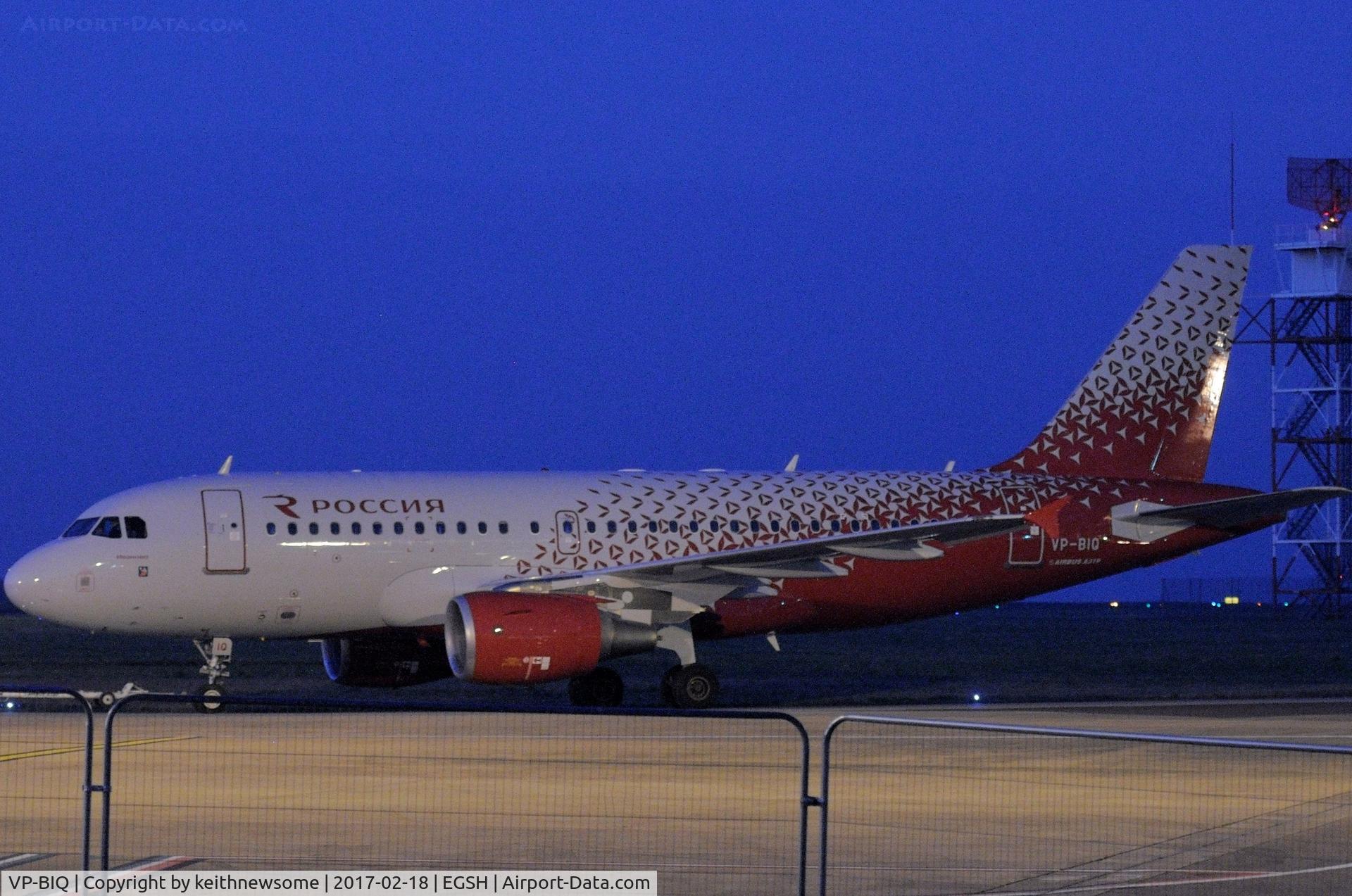 VP-BIQ, 2003 Airbus A319-111 C/N 1890, Leaving paint with building site fence in view.