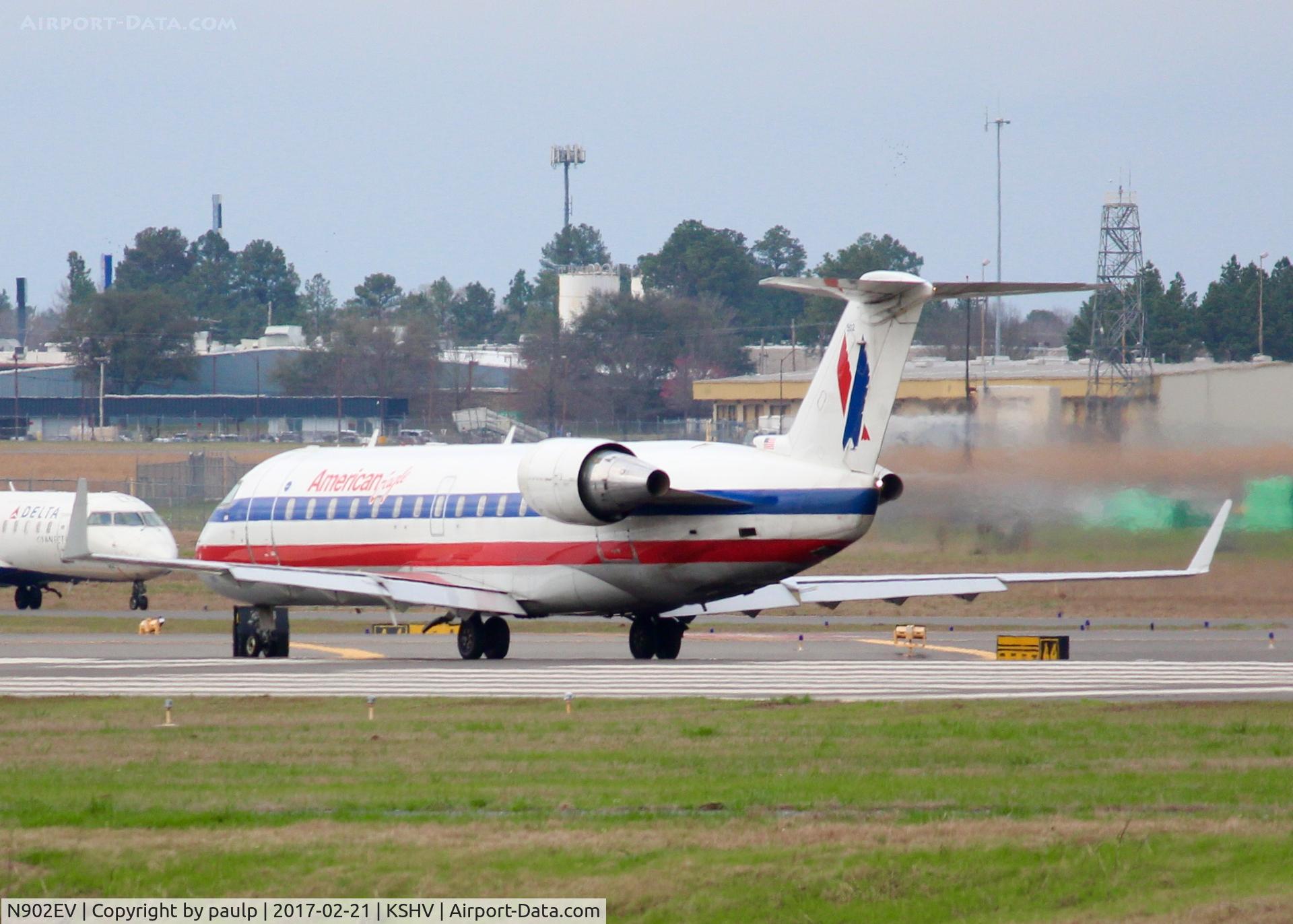 N902EV, 2002 Bombardier CRJ-200ER (CL-600-2B19) C/N 7620, Taking off from Shreveport Regional.