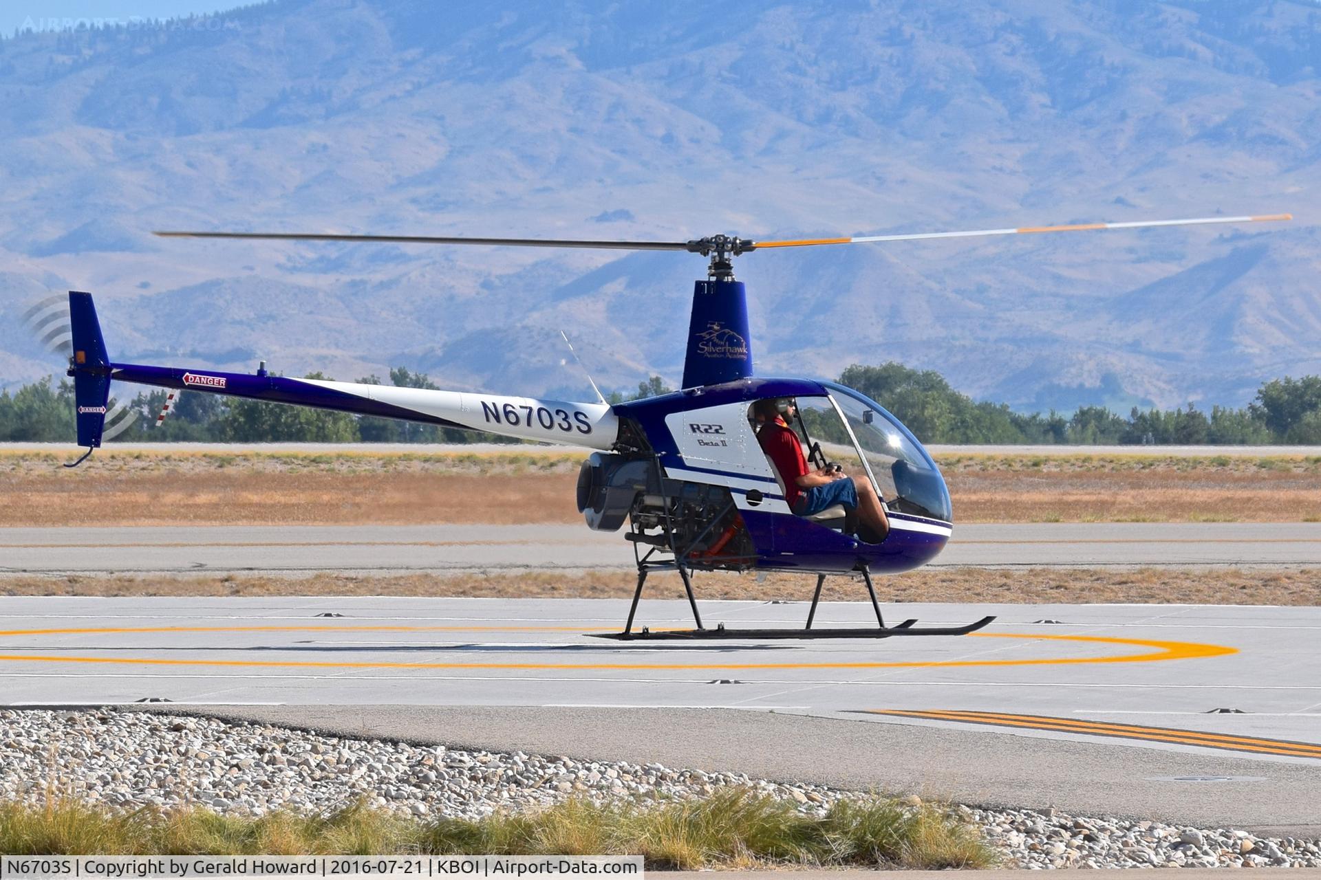 N6703S, 2004 Robinson R22 C/N 3621, Practicing landings on the south Helipad.