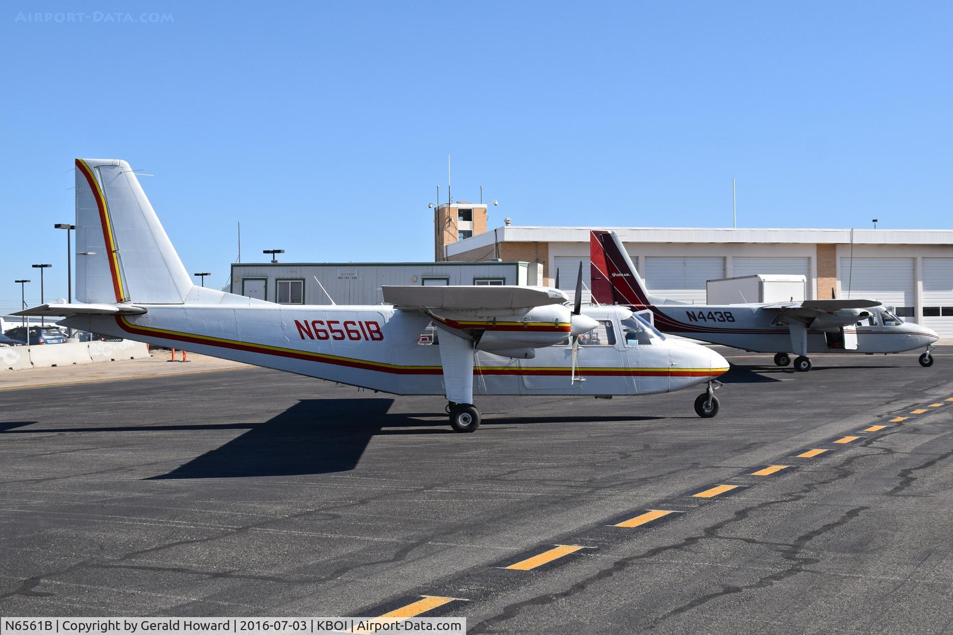 N6561B, 1976 Britten-Norman BN-2A-20 Islander C/N 520, Parked on the back country ramp (Gate 58) with N4438.