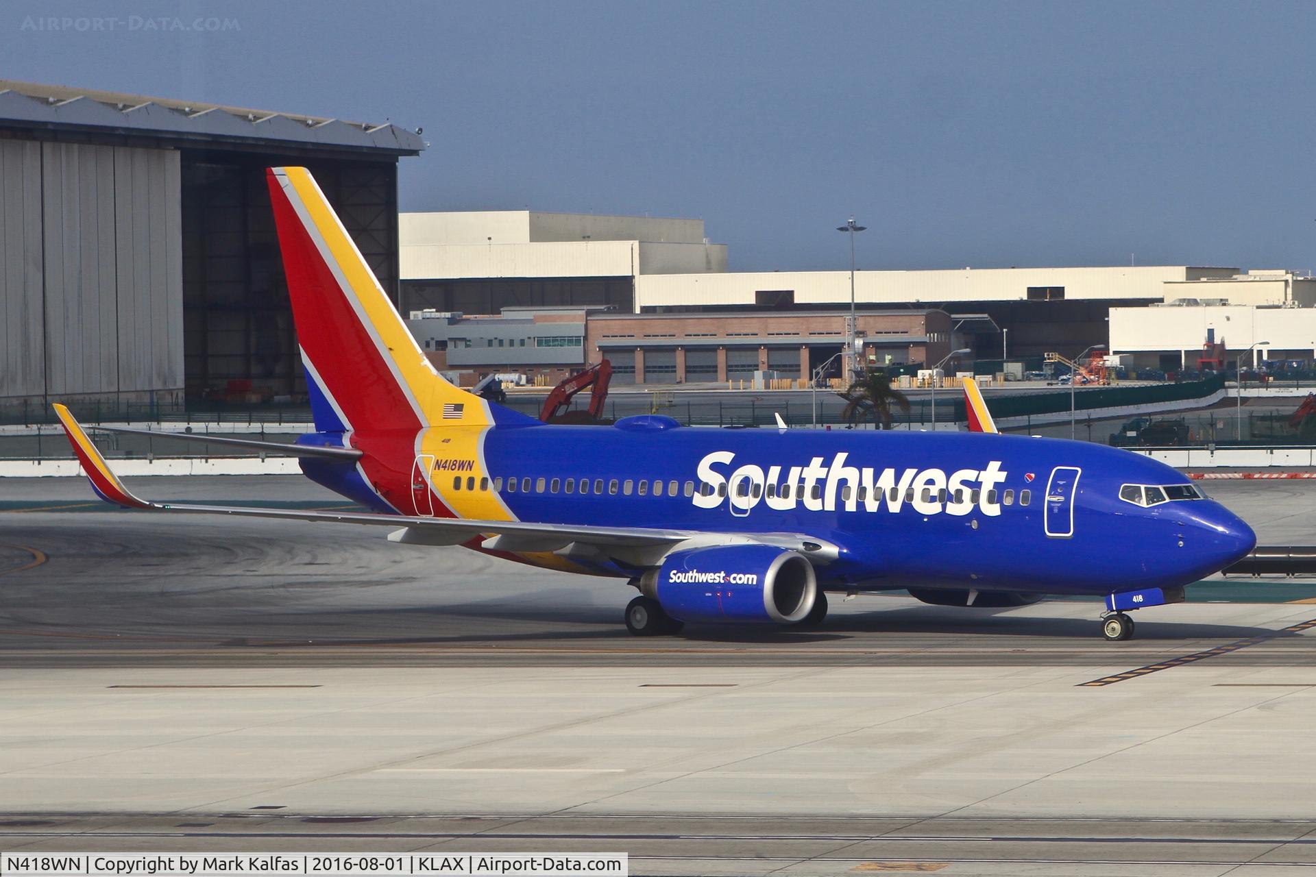 N418WN, 2001 Boeing 737-7H4 C/N 29823, Southwest N418WN (The Winning Spirit), 2001 Boeing 737-7H4,  at Tango 1 KLAX
