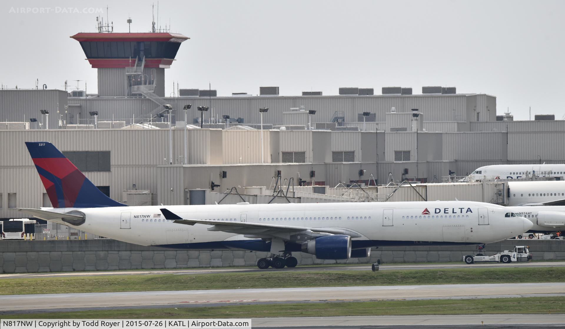 N817NW, 2007 Airbus A330-323 C/N 0843, Getting towed to a gate at Atlanta