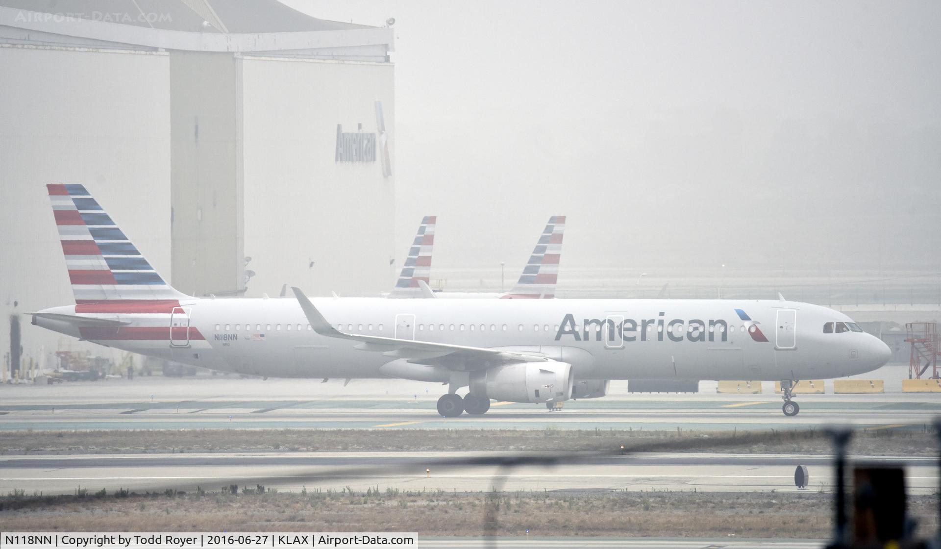 N118NN, 2014 Airbus A321-231 C/N 6162, Taxiing to gate on a foggy morning