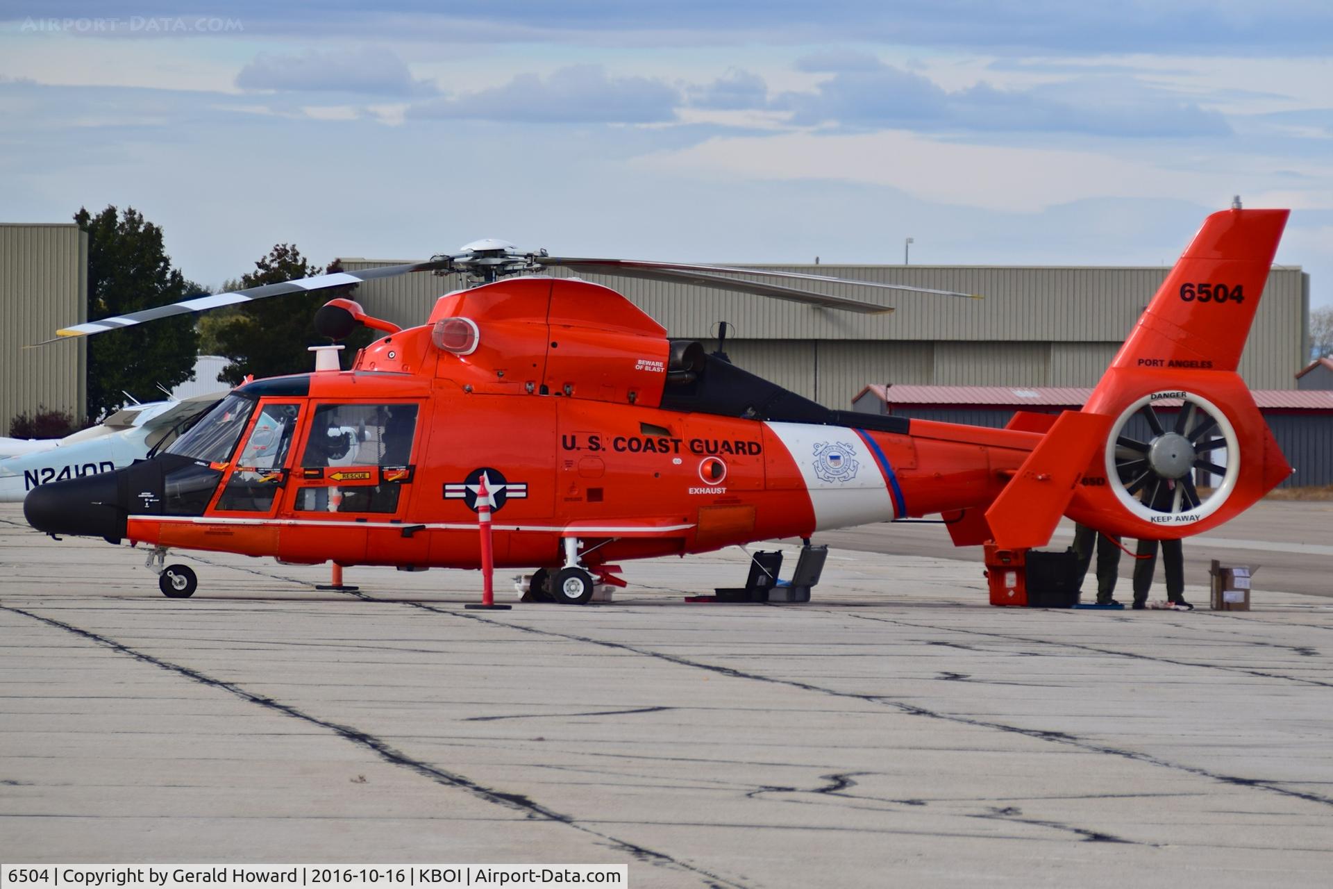 6504, Aerospatiale HH-65D C/N 6038, Parked on south GA ramp. USCG assigned Port Angeles, WA.