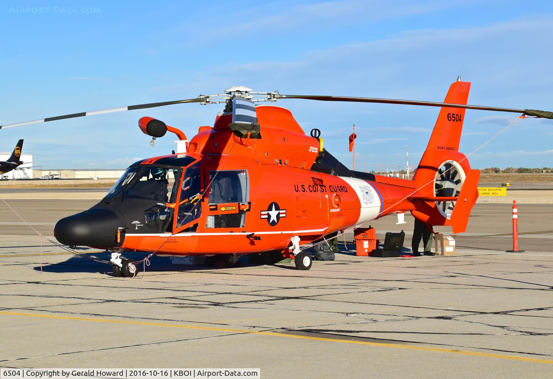 6504, Aerospatiale HH-65D C/N 6038, Parked on south GA ramp. USCG assigned Port Angeles, WA.
