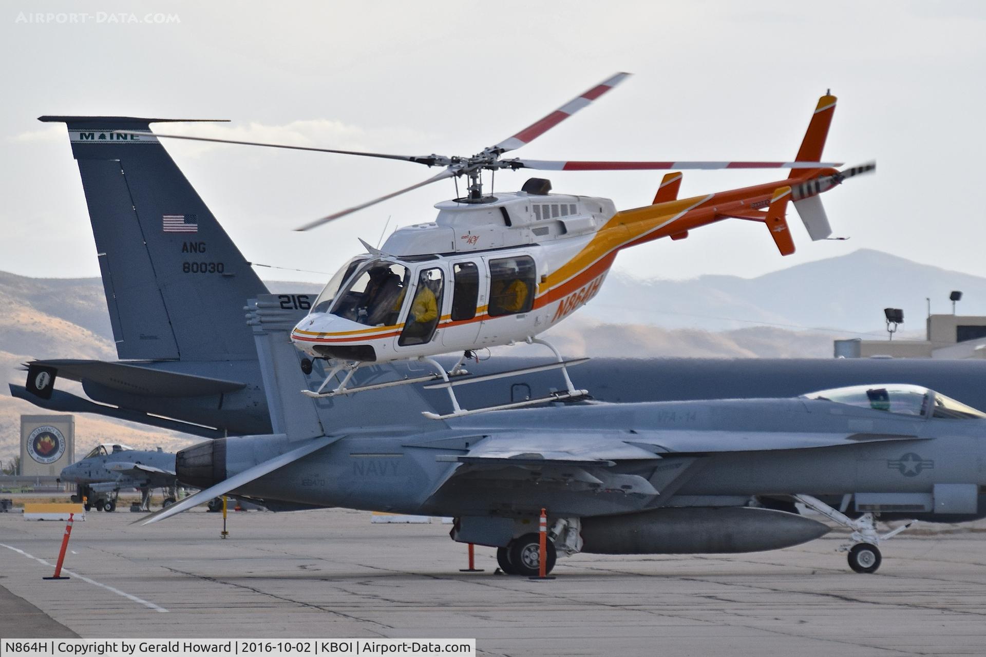 N864H, 1996 Bell 407 C/N 53017, Departing parking spot on south GA ramp.