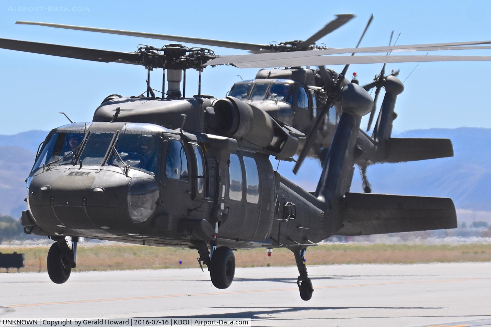 UNKNOWN, Helicopters Various C/N unknown, Two UH60Ls from the 1-183rd AVN BN, Idaho Army National Guard taxiing on Bravo.