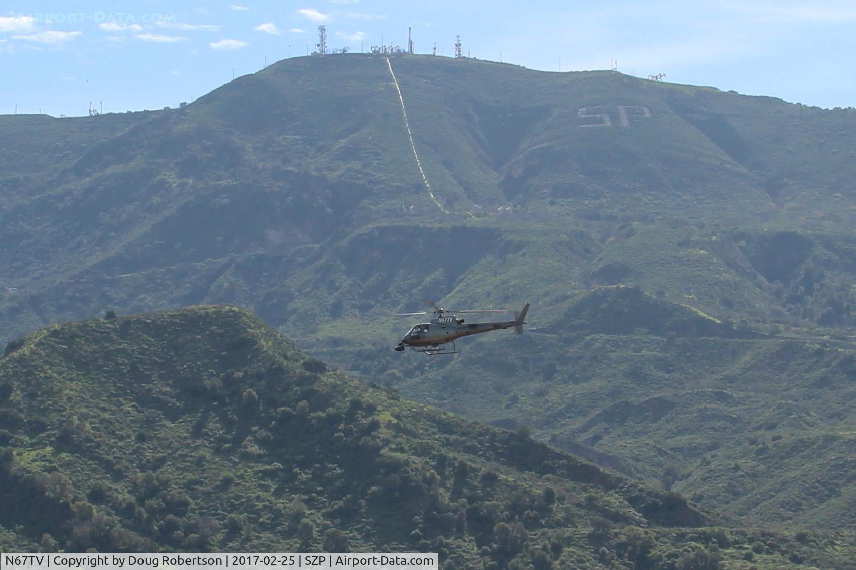 N67TV, 1995 Eurocopter AS-350B-2 Ecureuil Ecureuil C/N 2859, 1995 Eurocopter AS-350 B2 Ecureuil, one Turbomeca 1D1 turboshaft of 732 shp, departing SZP Helipad