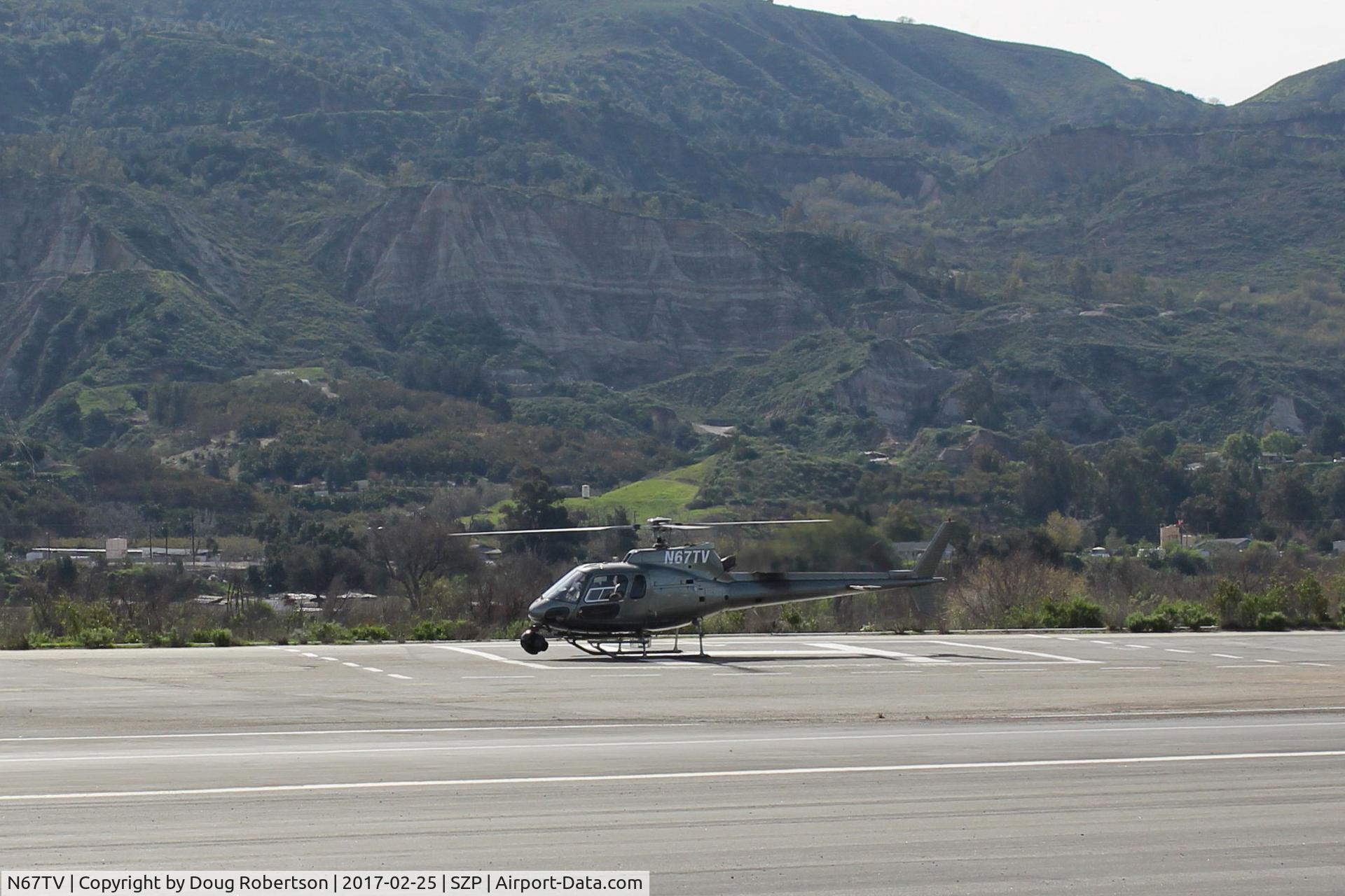 N67TV, 1995 Eurocopter AS-350B-2 Ecureuil Ecureuil C/N 2859, 1995 Eurocopter AS-350 B Ecureuil (Squirrel) marketed in North America as SuperStar, one Turbomeca Arriel 1D1 turboshaft of 732 sHp, on SZP Helipad-will do camera work today with N68405 Stearman Bipe.
