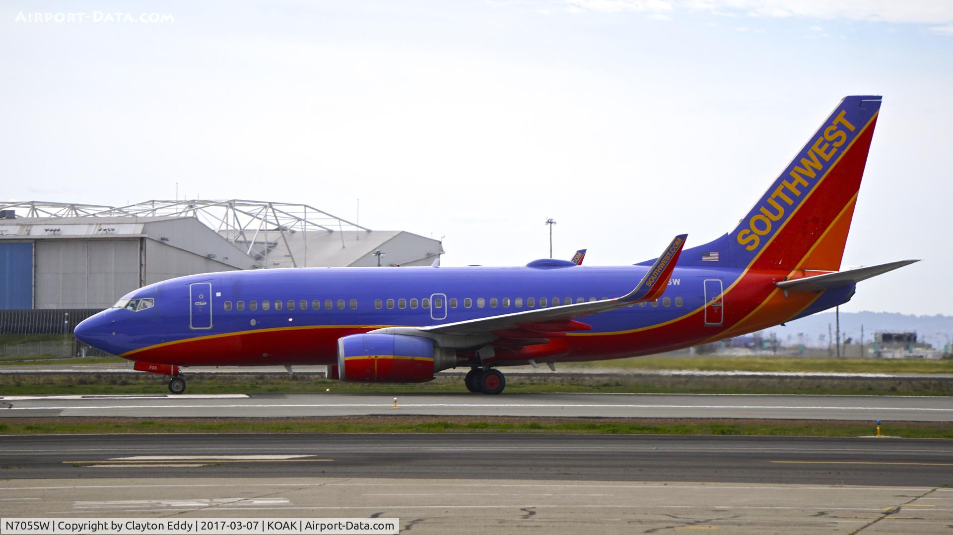 N705SW, 1998 Boeing 737-7H4 C/N 27839, Landing 28R at North Field Oakland Airport.