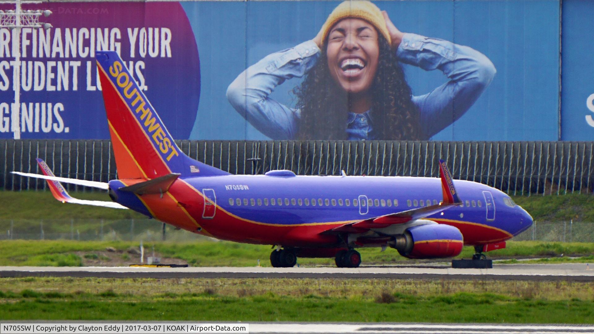 N705SW, 1998 Boeing 737-7H4 C/N 27839, Landing 28R at North Field Oakland Airport.