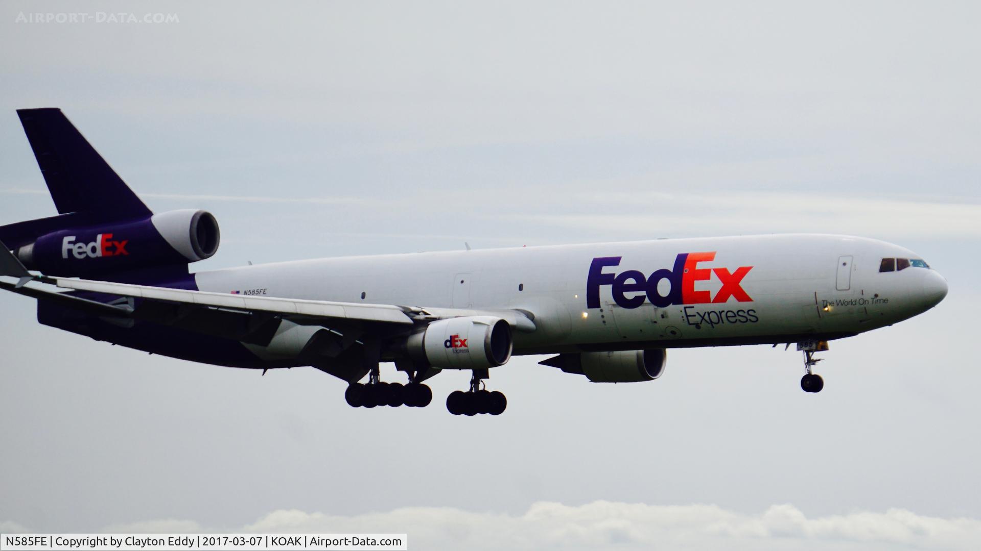 N585FE, 1992 McDonnell Douglas MD-11F C/N 48481, Landing runway 28R North Field Oakland Airport.