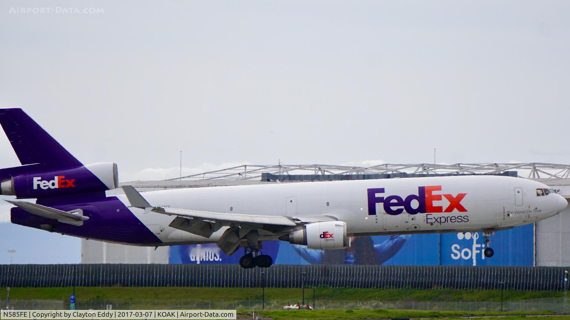 N585FE, 1992 McDonnell Douglas MD-11F C/N 48481, Landing runway 28R North Field Oakland Airport.