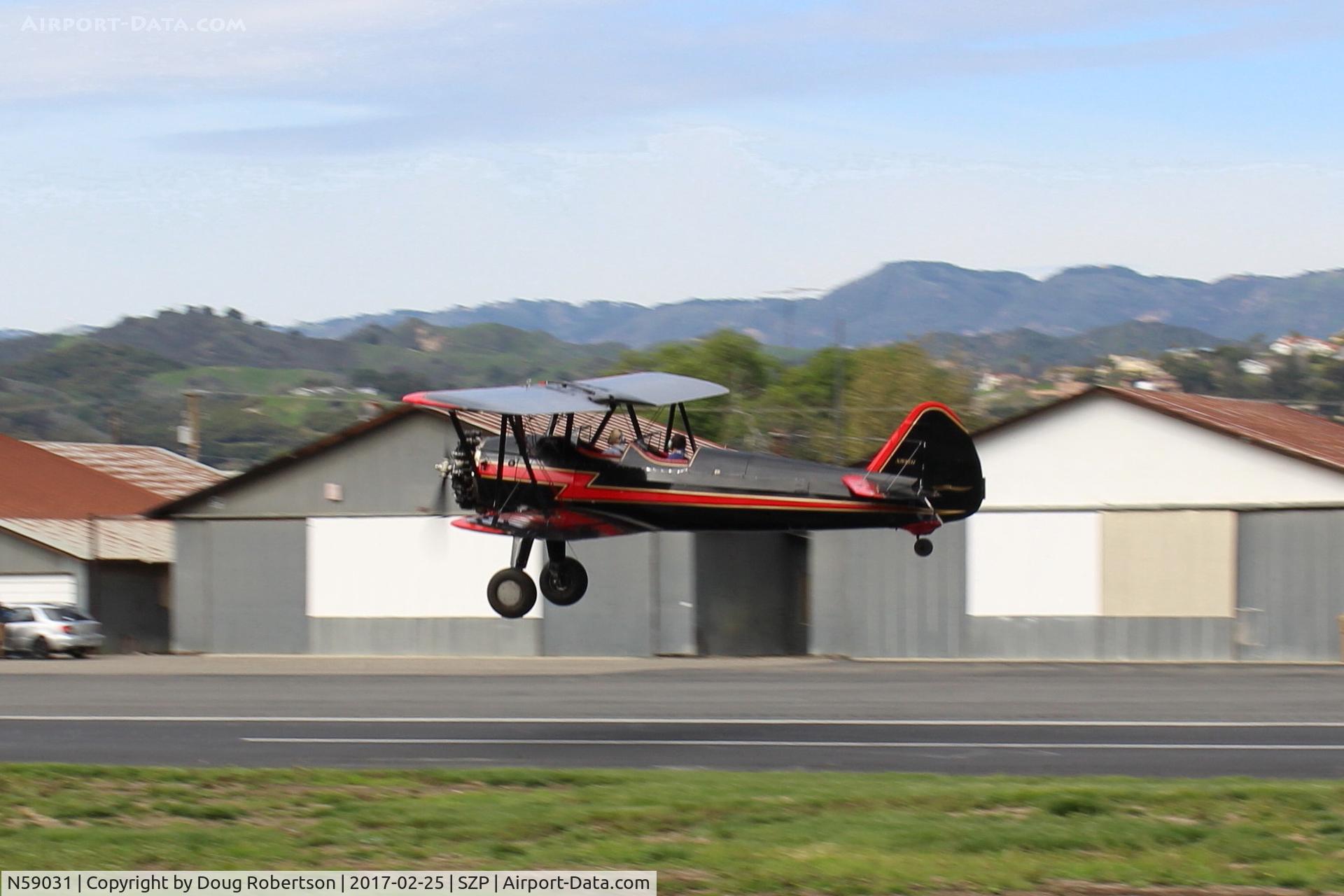 N59031, 1941 Boeing A75N1(PT17) C/N 75-3808, 1941 Boeing Stearman A75N1 (PT-17), Continental W670 220 Hp radial, takeoff climb Rwy 22