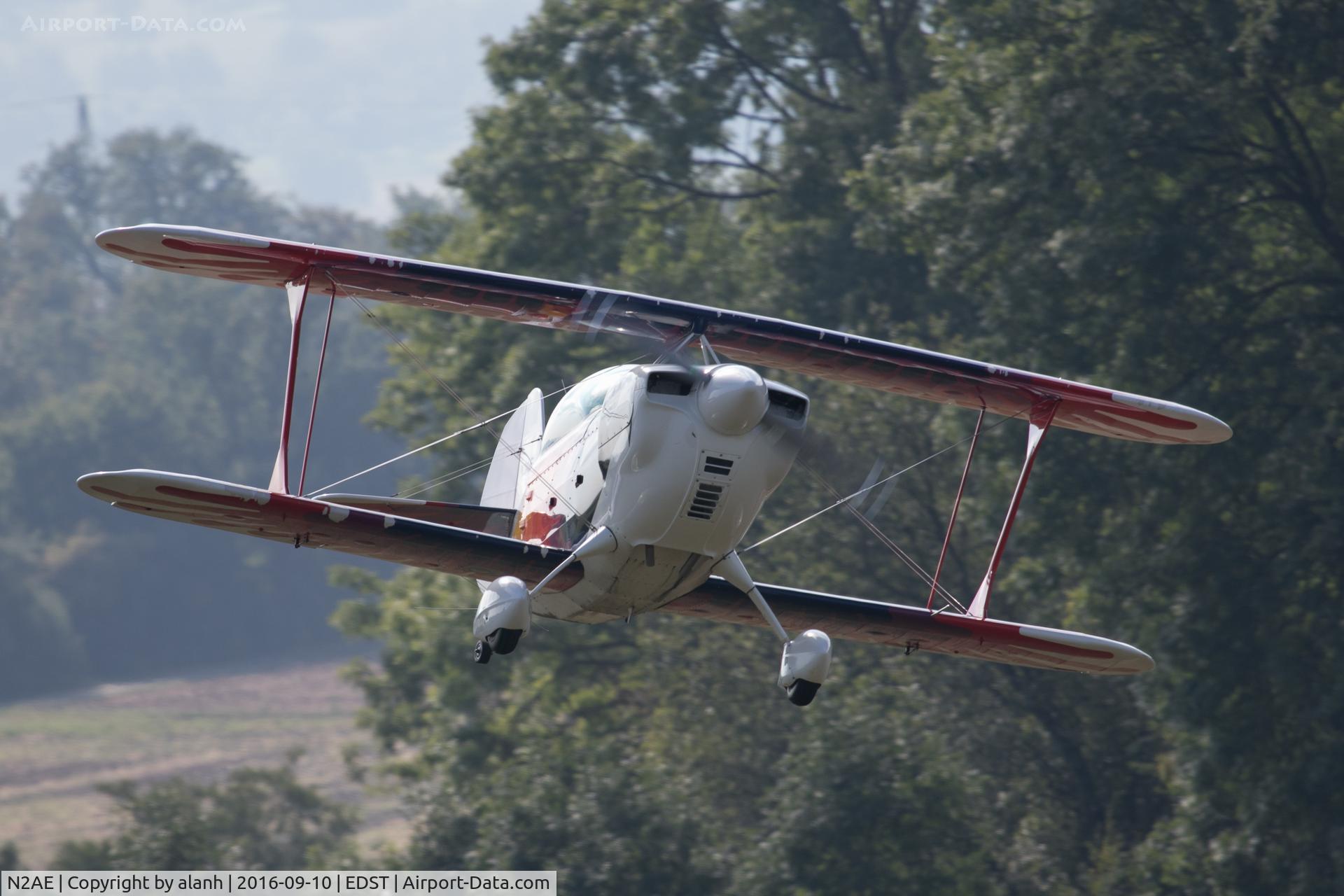 N2AE, 1983 Christen Eagle II C/N DICKSON-0001, Slipping past the trees at Hahnweide, Oldtimer Fliegertreffen 2016
