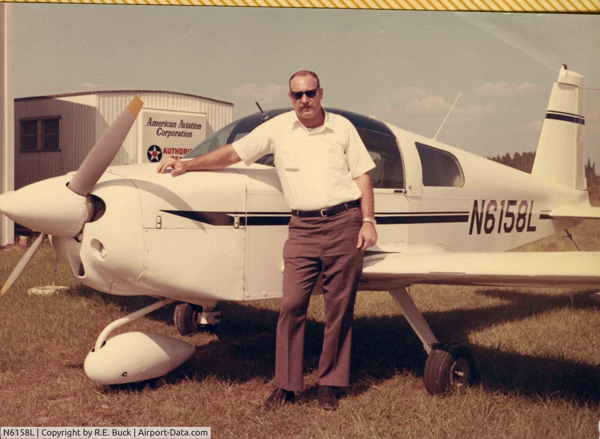 N6158L, 1970 American AA-1 Yankee C/N AA1-0358, Photo taken at Birdsong airport in Land-o-Lakes FL, Pilot standing by plane is R.E. Buck. Airport is currently Tampa North.