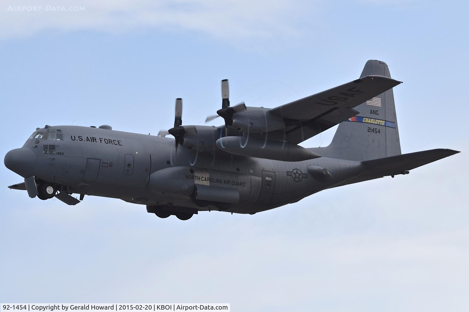 92-1454, 1992 Lockheed C-130H Hercules C/N 382-5333, Departing RWY 28L. Note the vortices off the props. 145th Airlift Wing, NC ANG.