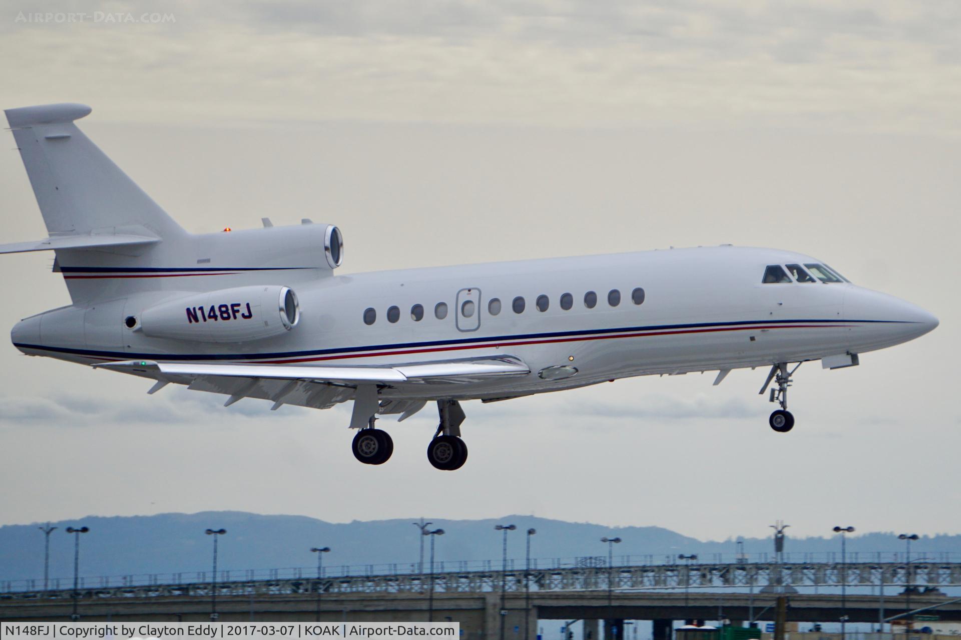 N148FJ, 1994 Dassault Falcon 900 C/N 148, Landing 28R at North Field Oakland California. 2017.