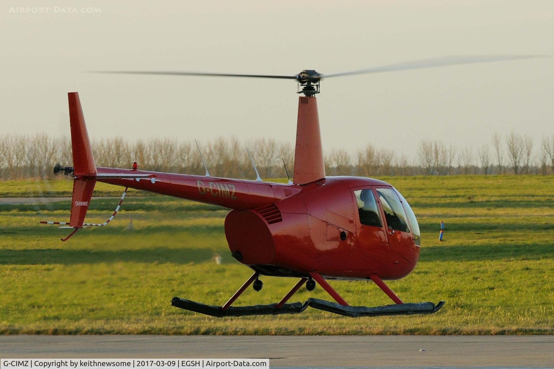 G-CIMZ, 2006 Robinson R44  Raven II C/N 11188, Landing in shade.