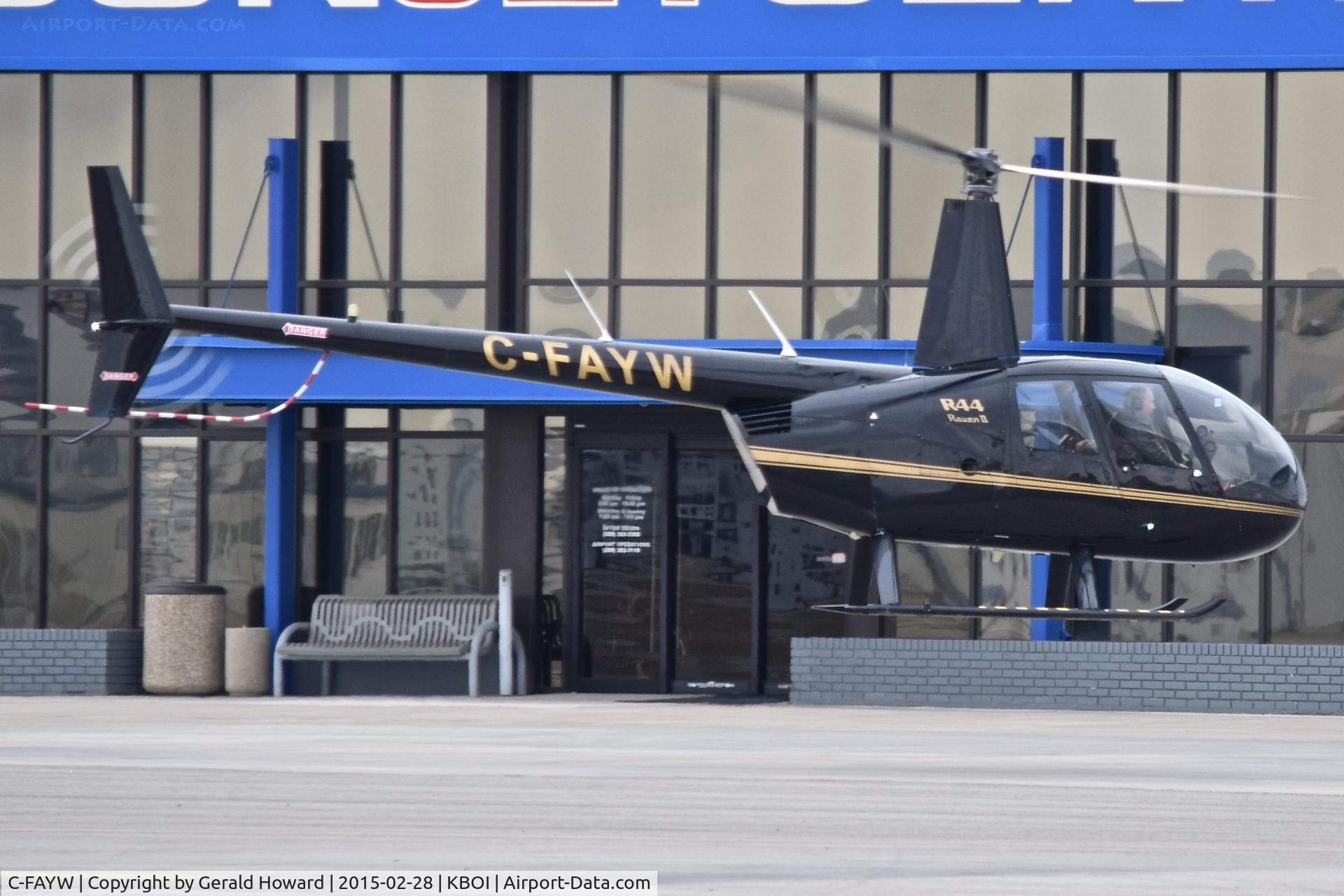C-FAYW, 2003 Robinson R44 II C/N 10122, Hover taxi on the north GA ramp.
