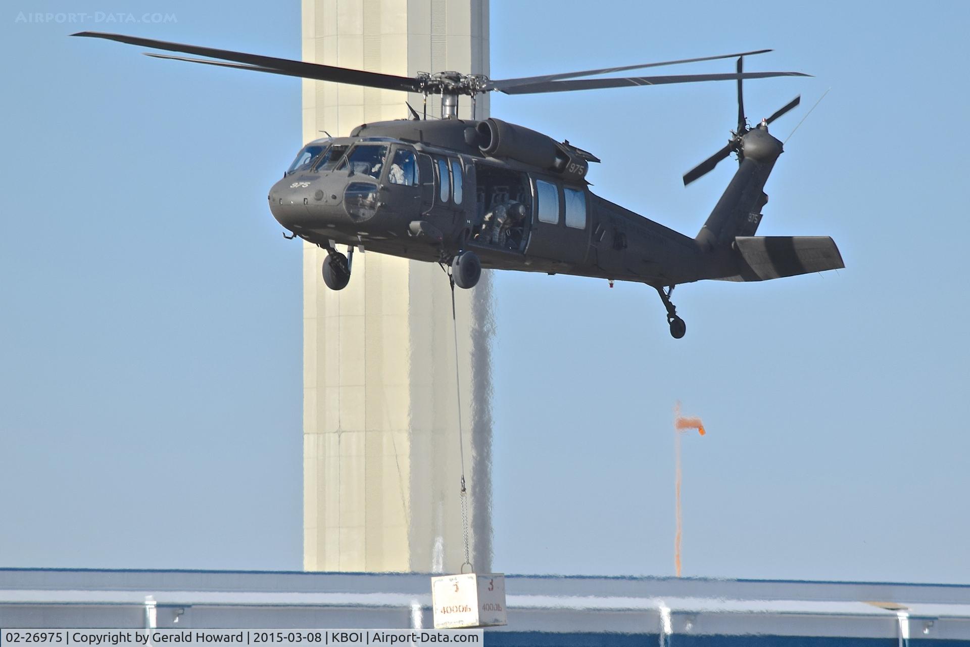 02-26975, 2002 Sikorsky UH-60L Black Hawk C/N 70-2777, Practice lifting weights (in place of water buckets)  for the upcoming fire season. 1-183rd AVN BN, Idaho Army National Guard.