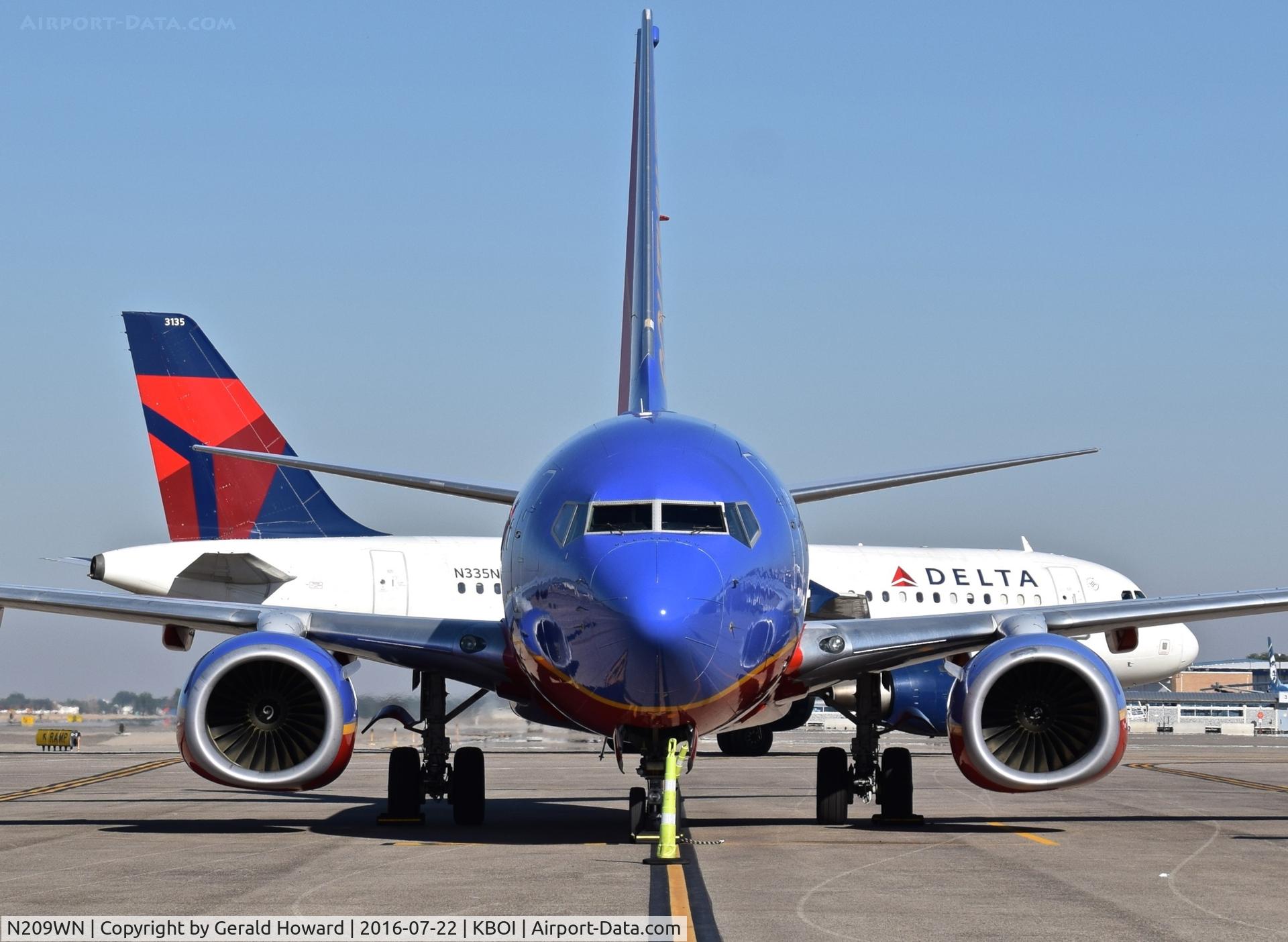 N209WN, 2005 Boeing 737-7H4 C/N 32484, Parked on remote spot 4 awaiting parts.