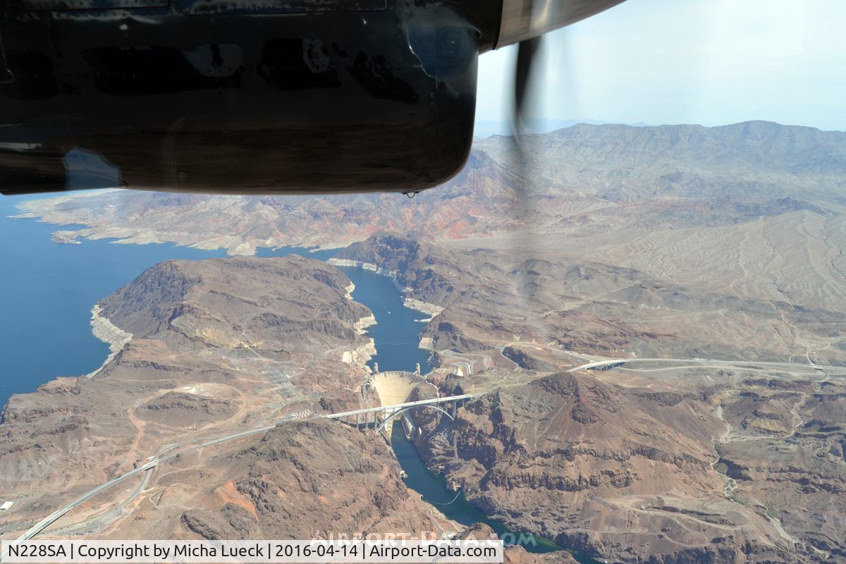 N228SA, 1969 De Havilland Canada DHC-6-300 Twin Otter C/N 253, Flying over Hoover Dam