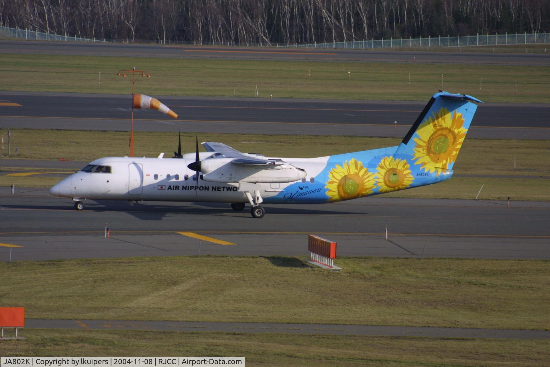 JA802K, 2001 De Havilland Canada DHC-8-314Q Dash 8 C/N 577, At Sapporo Chitose on a sunny November afternoon in 2004